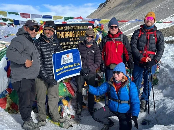 A trekking group at Thorong La Pass(5416 m), the highest point of the Annapurna Circuit Trek