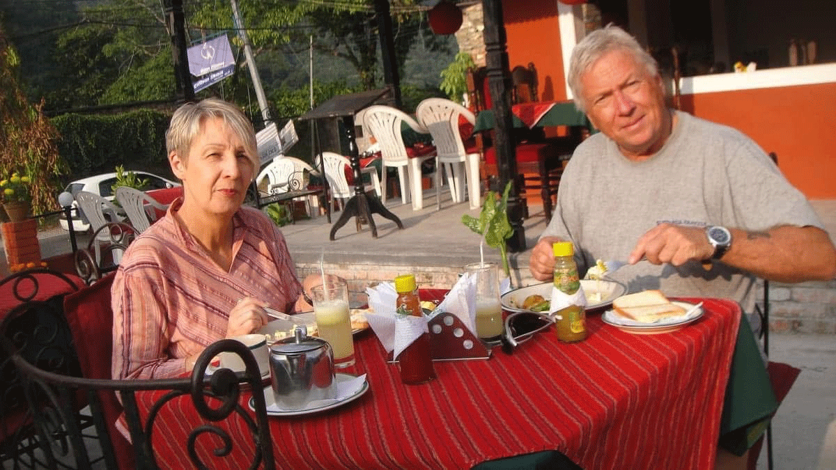 A couple, enjoying food on Annapurna Base Camp Trekking 