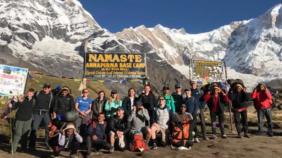 A group photo at the Annapurna Base Camp(4130 m), together with guides and porters 
